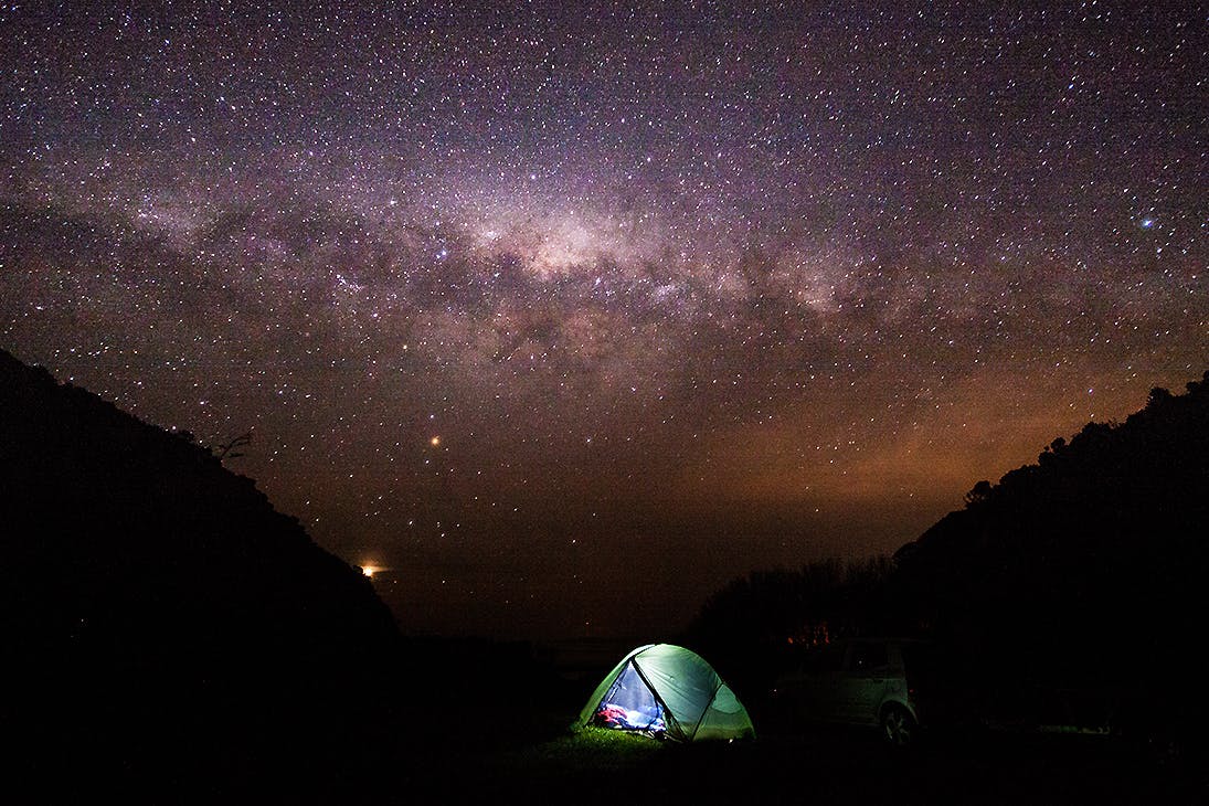 Camping under the starry sky, Aorangi Forest Park, Wairarapa, New Zealand.